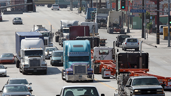 Refrigeratedtransporter 3368 Trucks Heavy Traffic Getty David Mcnew 0