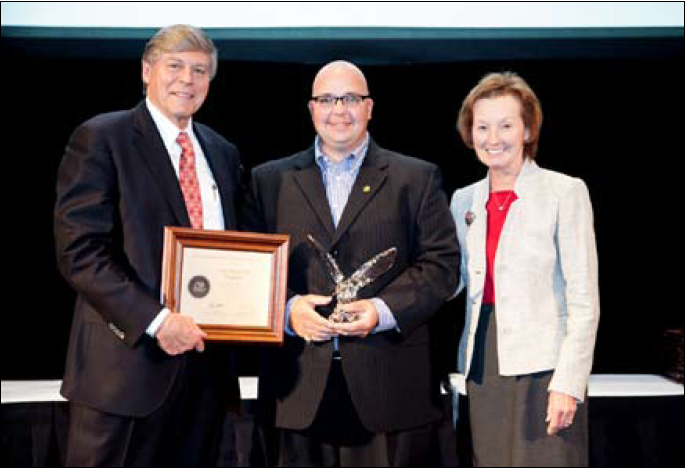 NPTC Top grad Joey Wood Gary Petty and Wendy Leavitt