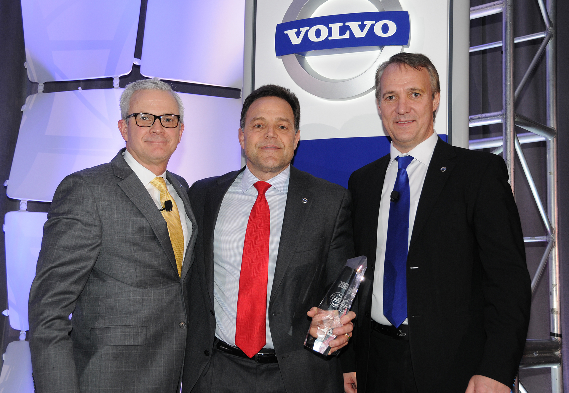 Nacarato Volvo vice president Joe Nacarato center receives the 2013 Volvo Trucks North American Dealer of the Year from left Terry Billings Volvo Trucks vice president ndash business development and right Goumlran Nyberg president Volvo Trucks North American sales amp marketing