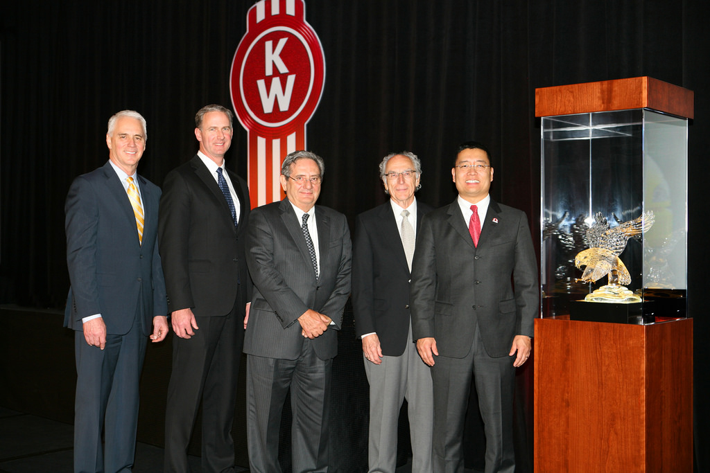 Wisconsin Kenworth received the prestigious 2013 Kenworth Dealer of the Year Award for the United States and Canada at the Kenworth Dealer Meeting held recently in the Seattle area From left are Gary Moore Kenworth general manager and PACCAR vice president Preston Feight Kenworth assistant general manager for sales and marketing and Wisconsin KenworthCSM Companies executives Bob Sorrentino Curt Collins and Jim Moeller