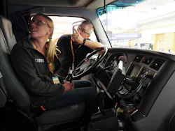 Attendees check out a Kenworth T680 tractor that PacLease brought to the exhibition hall to help show off available vehicle diagnostics systems View photo gallery from the conference Attendees check out a Kenworth T680 tractor that PacLease brought to the exhibition hall to help show off available vehicle diagnostics systems View photo gallery from the conference
