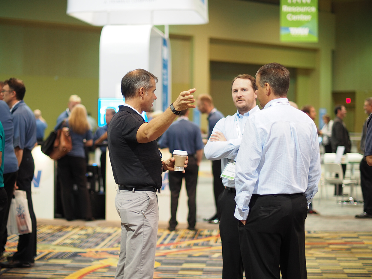 Attendees and exhibitors mingle at the TMW Transforum conference in Orlando FL where ALK Technologies announced that its navigation and routing technology has been certified for use with a number of TMW Systems39 software products Photo by Aaron Marsh
