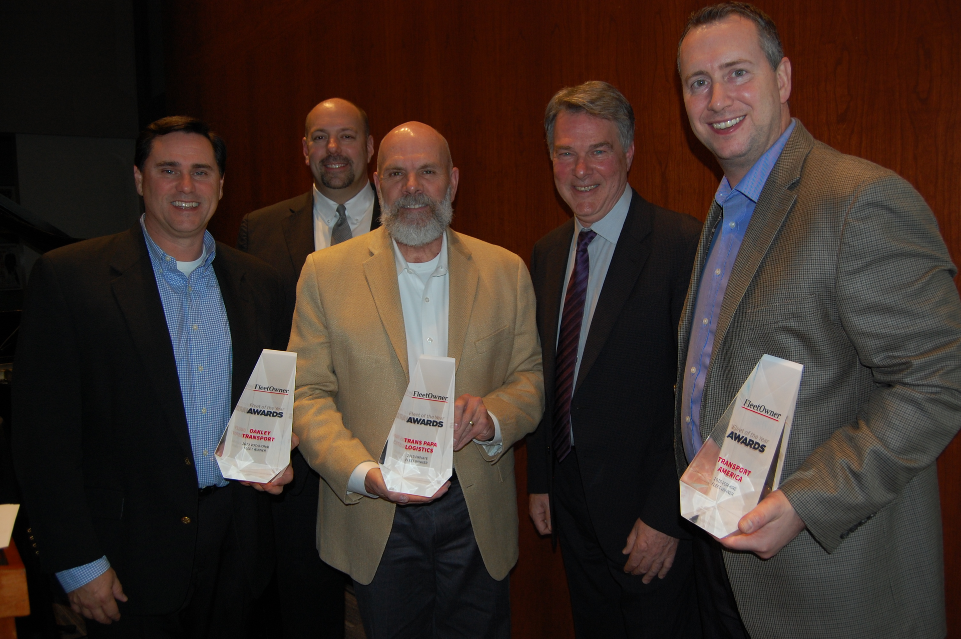 Left to right Ronnie Oakley Jr Oakley Transport Mike Harvey WIX Filters Cameron Hafer Trans Papa Logistics Jim Mele Fleet Owner magazine Phill Reynolds Transport America