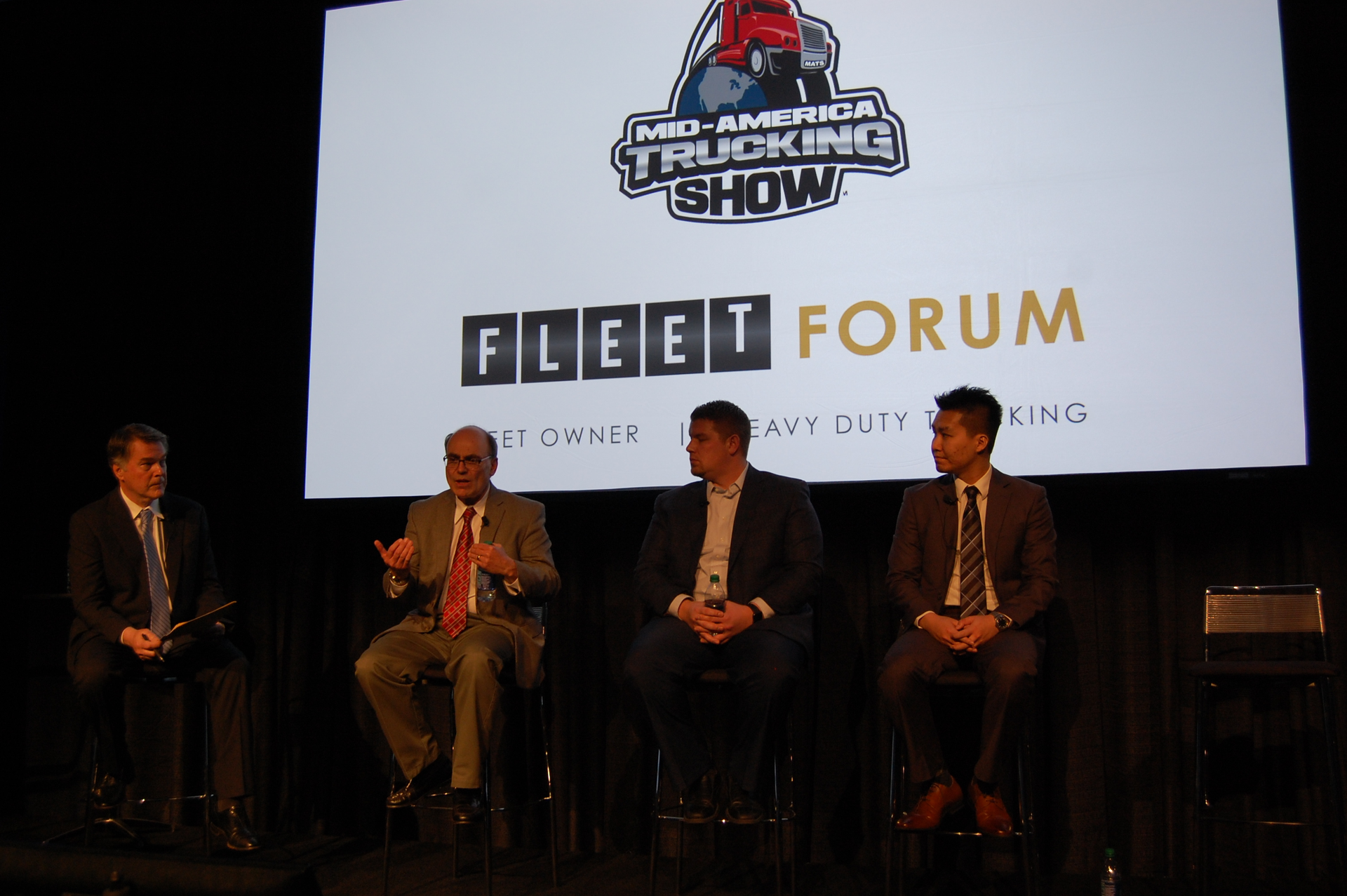 Left to right Jim Mele editor in chief of Fleet Owner Fred Andersky Bendix Commercial Vehicle Systems Thayne Boren Truckstopcom Wallace Lau Frost amp Sullivan Photo by Sean KilcarrFleet Owner