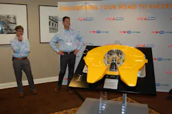 SAFHolland39s Bryan Redeker far left and Mark Molitor with an FW35 fifth wheel equipped with the new ELIte system Photo by Sean KilcarrFleet Owner SAFHolland39s Bryan Redeker far left and Mark Molitor with an FW35 fifth wheel equipped with the new ELIte system Photo by Sean KilcarrFleet Owner