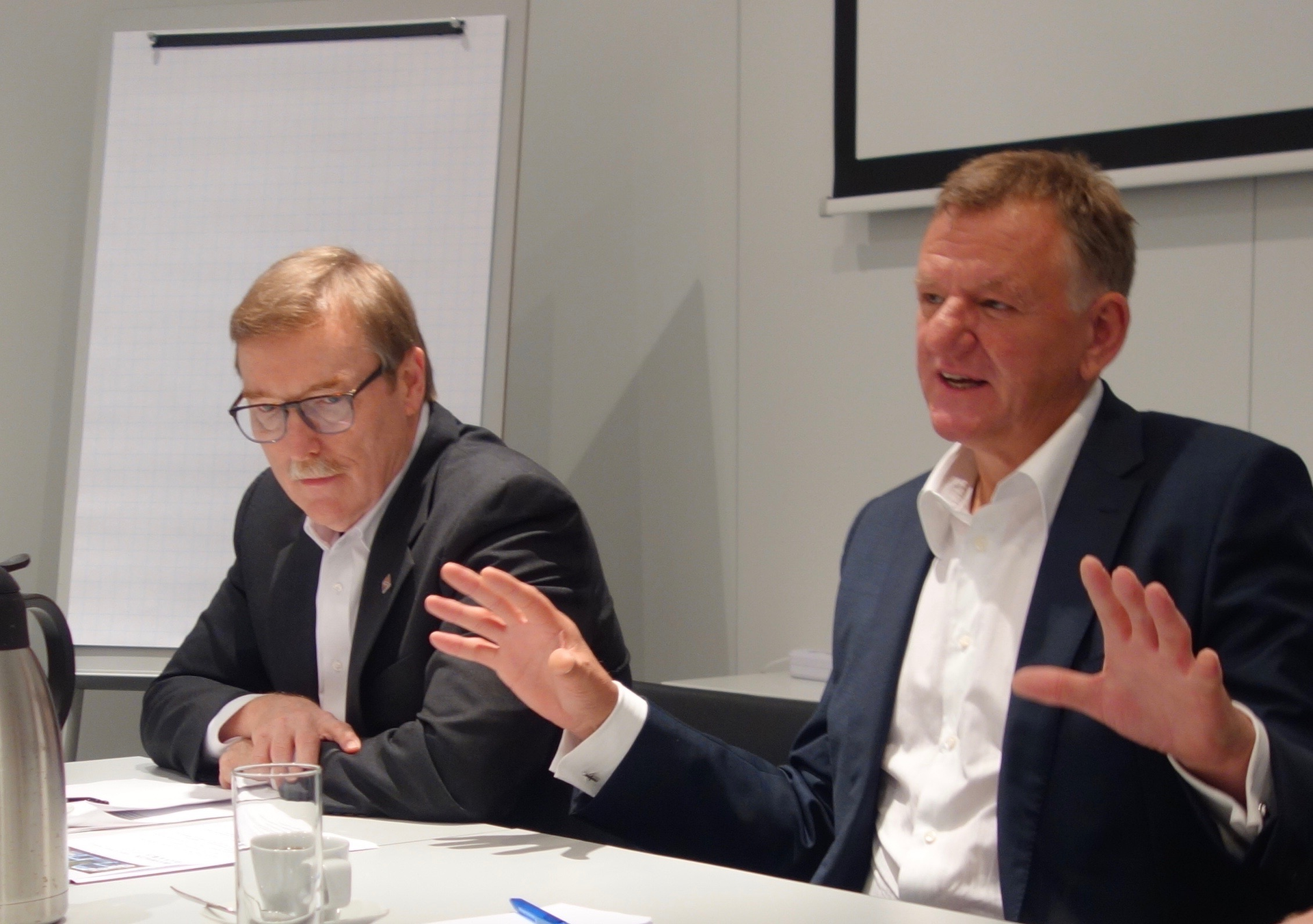 Navistar President and CEO Troy Clarke left and VW Truck amp Bus head Andreas Renschler speak during a conference at IAA 2016