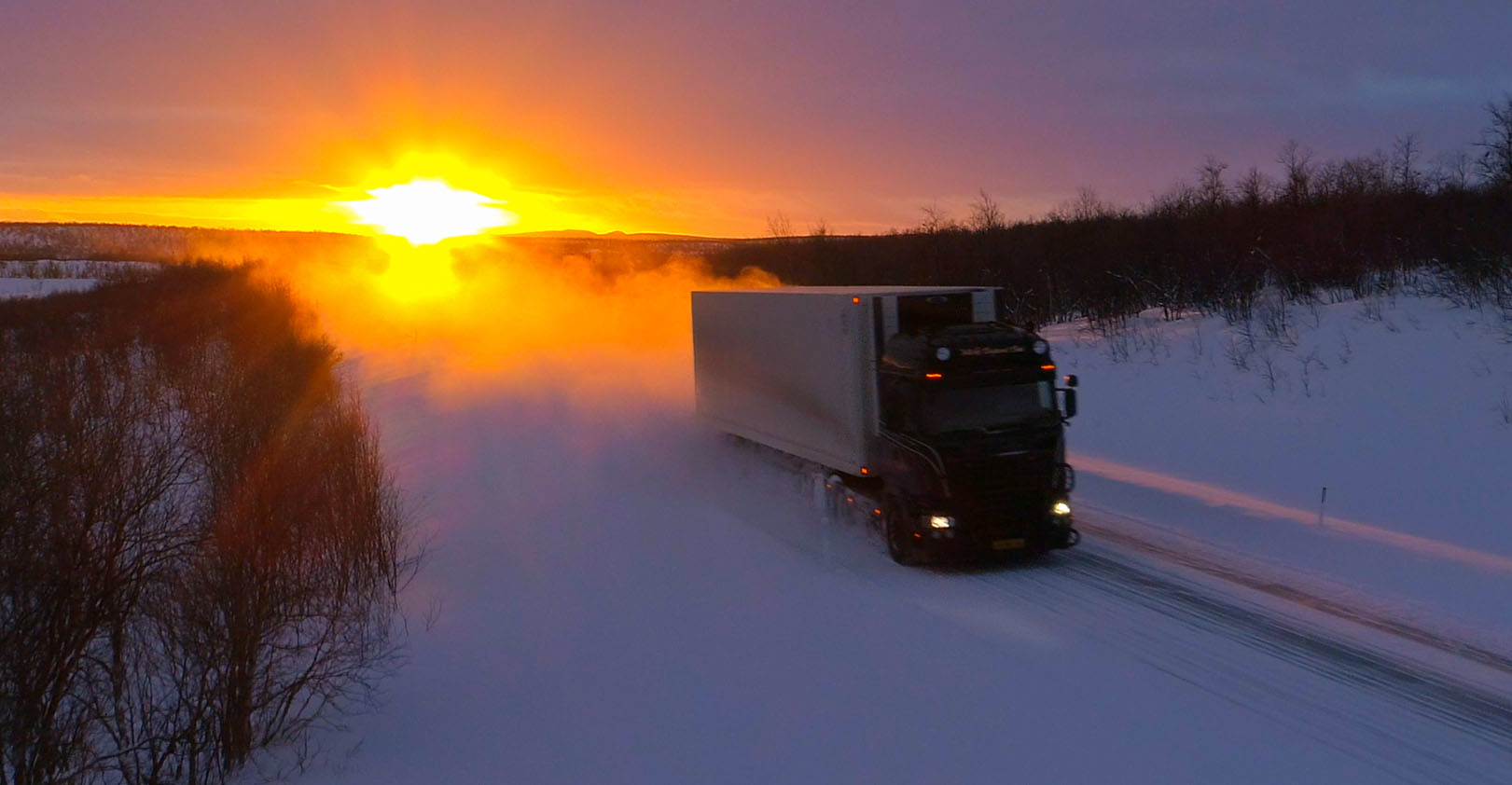truck-snow-sunrise-helivideo.jpg