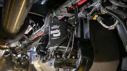 Pictured is a Bendix AD-IS dryer with PuraGuard oil-coalescing filter mounted on a truck. Oil-coalescing filters are essential for trucks with AMTs due to an AMTs’ need for extremely high-quality air. Pictured is a Bendix AD-IS dryer with PuraGuard oil-coalescing filter mounted on a truck. Oil-coalescing filters are essential for trucks with AMTs due to an AMTs’ need for extremely high-quality air.