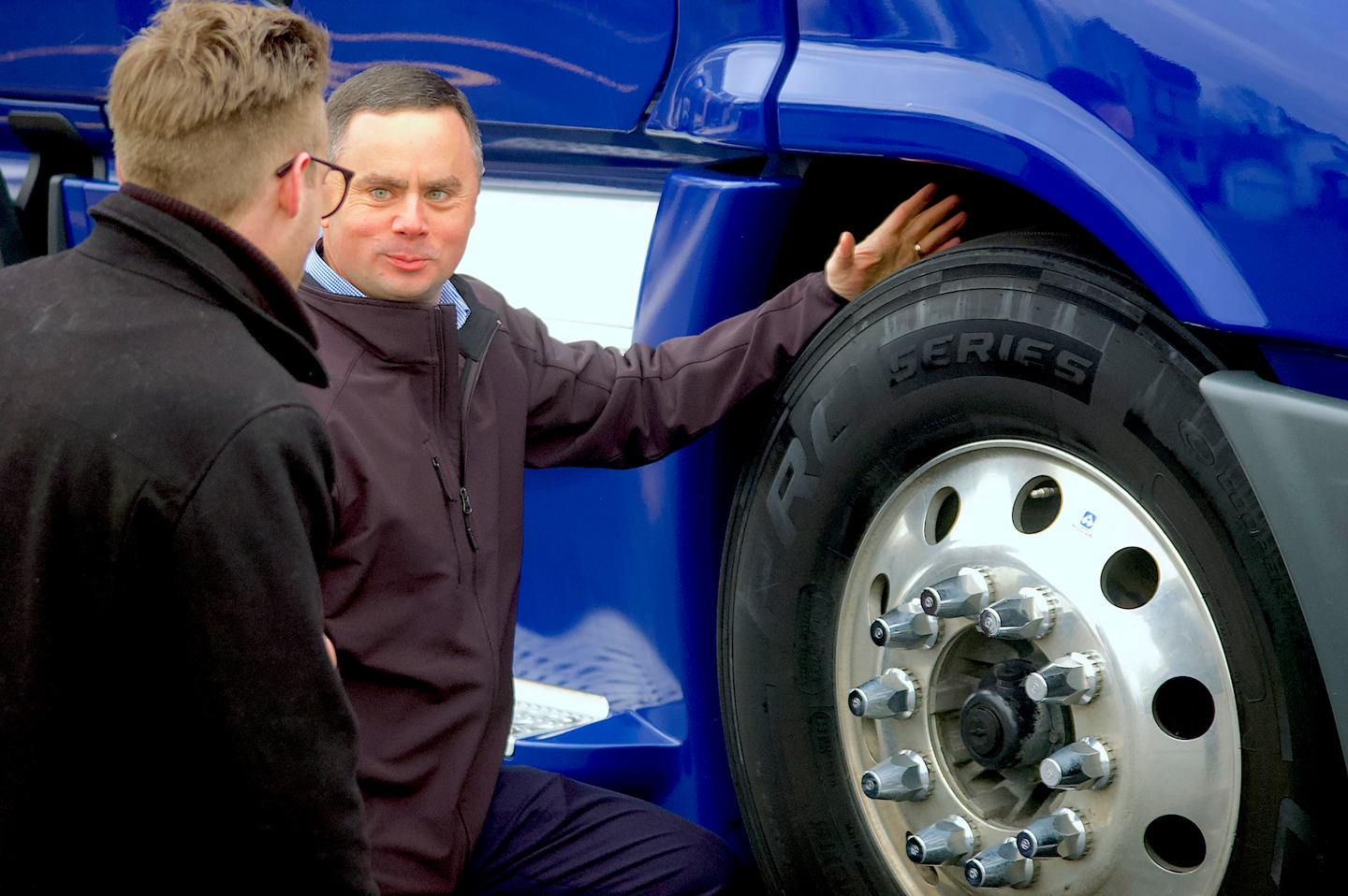 Phil Mosier, Cooper Tire’s manager of commercial tire development, shows off a PRO Series steer tire.