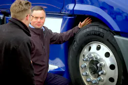 Phil Mosier, Cooper Tire’s manager of commercial tire development, shows off a PRO Series steer tire. Phil Mosier, Cooper Tire’s manager of commercial tire development, shows off a PRO Series steer tire.