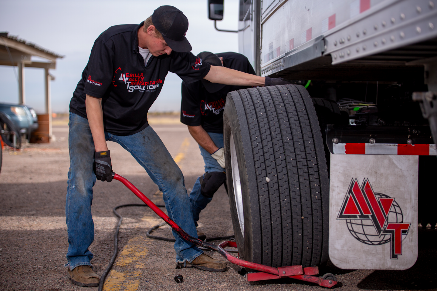 MVT Solutions workers swap out tires during testing. The company has an established system based on the racing industry to validate which LRR tires will provide a fleet the best ROI.