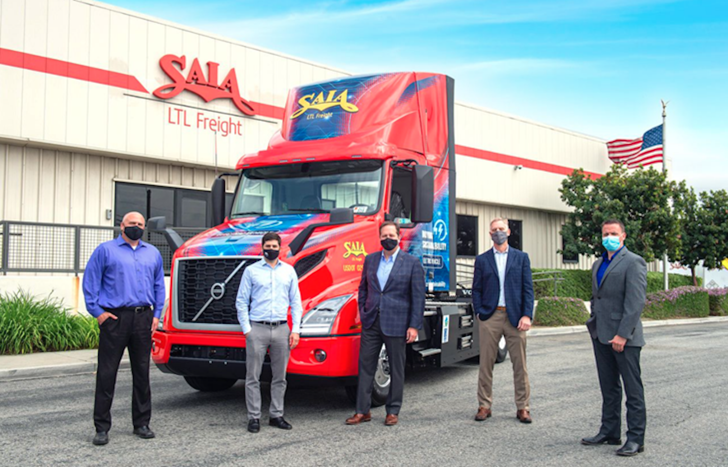 Saia representatives pictured from left to right: Kevin Szydel, vice president of operations, west; Patrick Sugar, executive vice president of operations; Fritz Holzgrefe, president and chief executive officer; Cris Burgum, vice president of maintenance and properties; and Brandon Bruton, director of maintenance and administration.