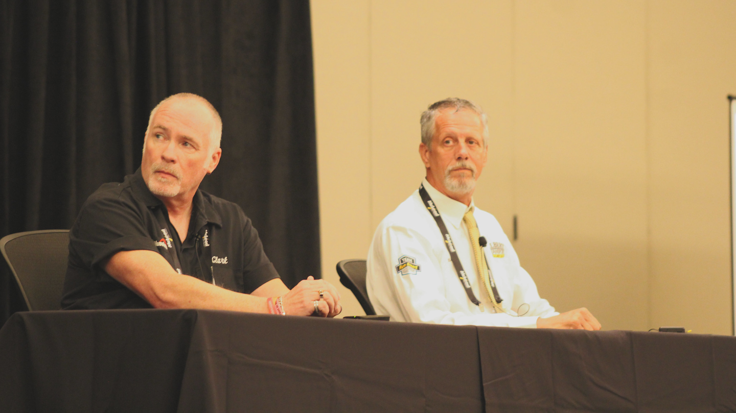 From left, Clark Reed, company driver and trainer for Nussbaum Transportation, and Henry Albert, owner of Albert Transport, discuss safety perspectives from the driver's seat during TCA's Safety & Security Meeting in St. Louis.