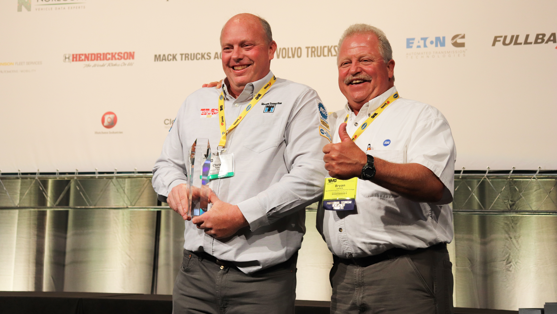 Chris Tate of Mohawk Trucks celebrates his second TMC SuperTech first place finish with fellow two-time grand champion Bryan Lewis at TMC 21 in Cleveland. Tate competed in 16 SuperTech competitions and plans to become a judge in the competition next year.