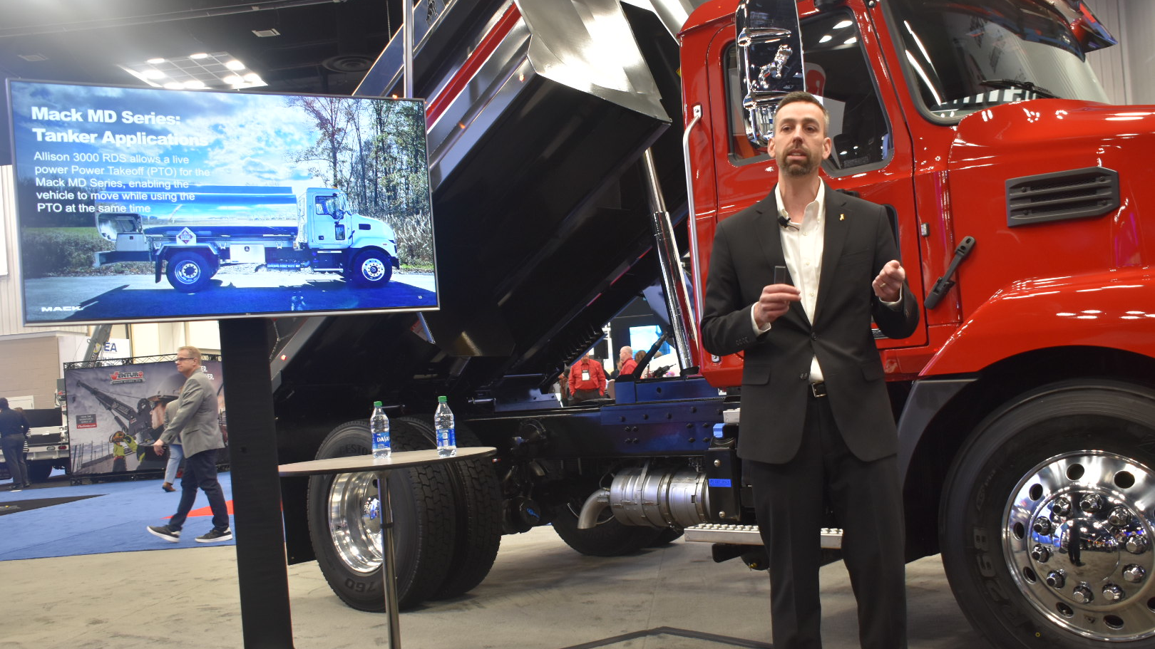 Tim Wrinkle, Mack&rsquo;s construction product manager, helps introduce the Allison upgrade at the OEM's exhibit space at Work Truck Week 2022 on March 9.