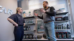 Fleetrite employees chat at a parts store location. Fleetrite employees chat at a parts store location.