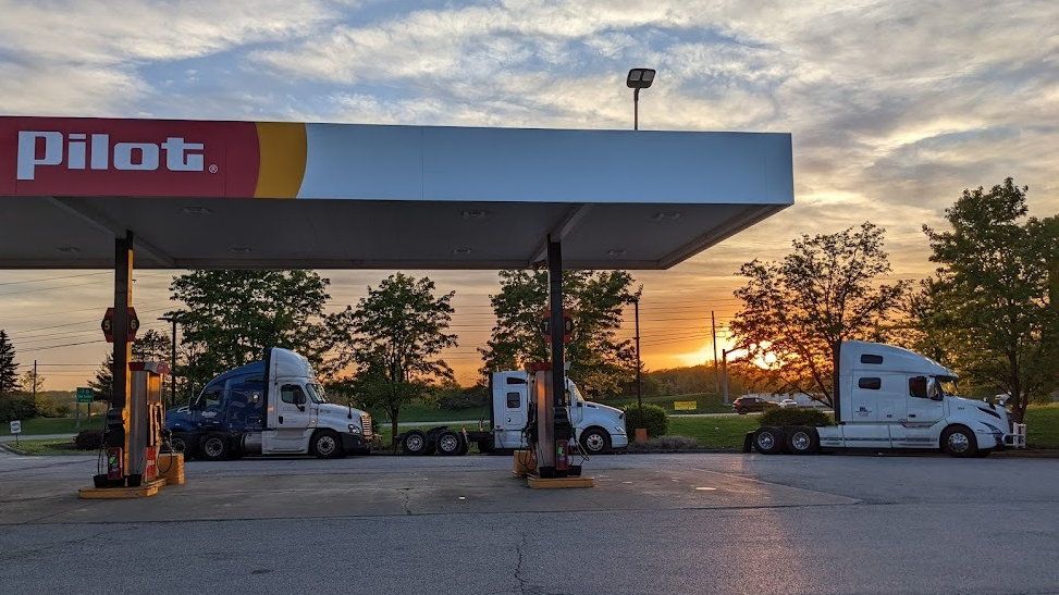 Commercial tractors sit idle at a Richfield, Ohio, travel stop.