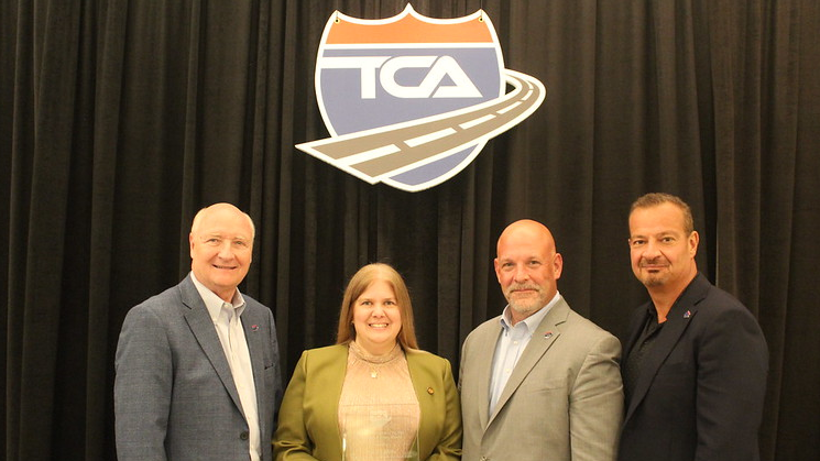From left: Truckload Carriers Association President Jim Ward; FTC Transportation's Emory Mills, winner of the 2022 Safety Professional of the Year award; David Heller, TCA's VP of government affairs; and TCA Chairman and Load One CEO John Elliott.