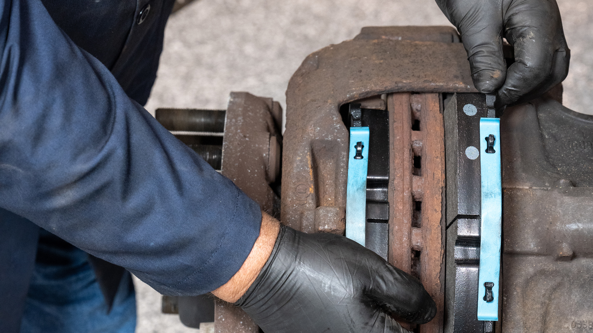 Kevin Pfost, Bendix&rsquo;s coordinator of technical service, performs a brake inspection.