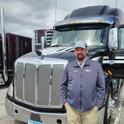 Aaron Puterbaugh, a driver for carrier Long Haul Trucking out of Minnesota, next to his 2021 Peterbilt 579 Ultraloft. Aaron Puterbaugh, a driver for carrier Long Haul Trucking out of Minnesota, next to his 2021 Peterbilt 579 Ultraloft.