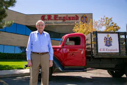 G.E. “Gene” England, who still comes to work twice a week, stands with a vintage C.R. England truck outside the fleet's Salt Lake City headquarters. G.E. “Gene” England, who still comes to work twice a week, stands with a vintage C.R. England truck outside the fleet's Salt Lake City headquarters.