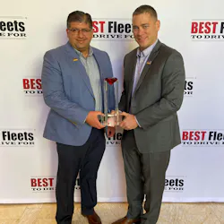 Grand Island Express's Jim Pirnie, president, and Deen Albert, VP of Operations, hold an award for placing in the Best Fleets to Drive for Hall of Fame. Grand Island Express's Jim Pirnie, president, and Deen Albert, VP of Operations, hold an award for placing in the Best Fleets to Drive for Hall of Fame.