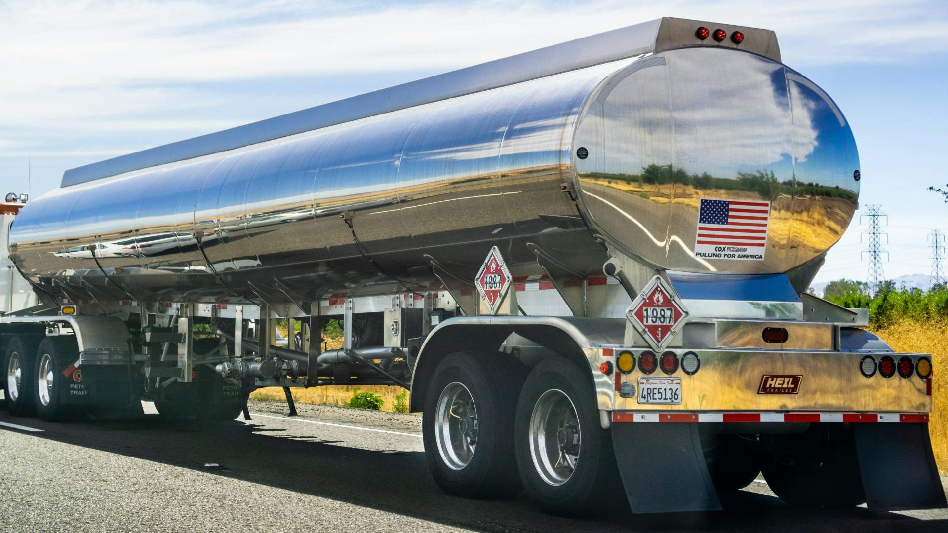 truck hauling tank trailer