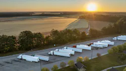 trucks parked at rest area near highway trucks parked at rest area near highway