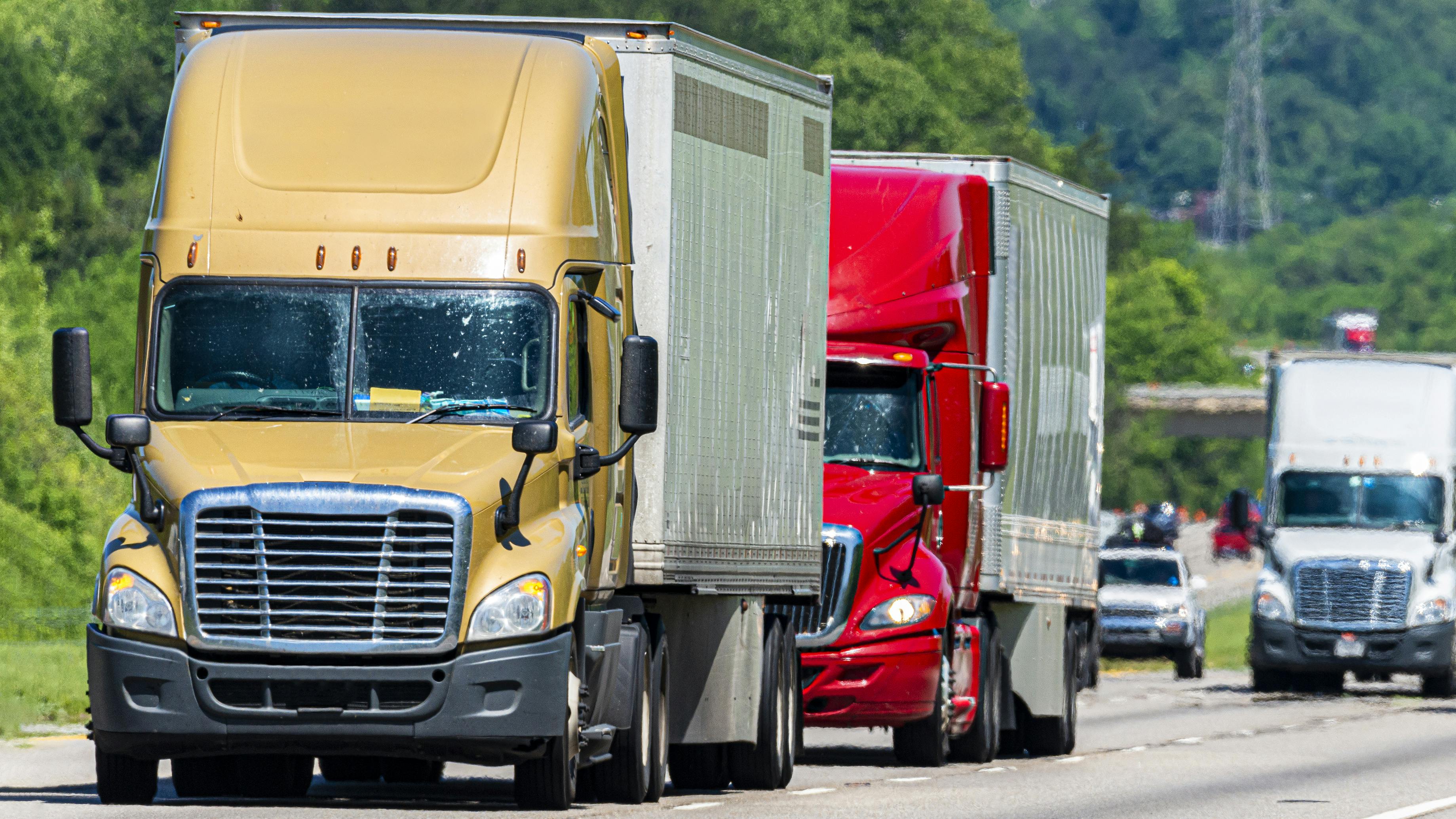 Conventional cab trucks on highway