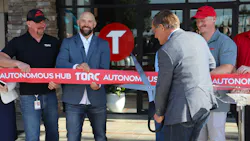 Torc CEO Peter Schmidt cuts a ceremonial ribbon during the official grand opening of the company's first autonomous trucking hub in Fort Worth, Texas. Torc CEO Peter Schmidt cuts a ceremonial ribbon during the official grand opening of the company's first autonomous trucking hub in Fort Worth, Texas.