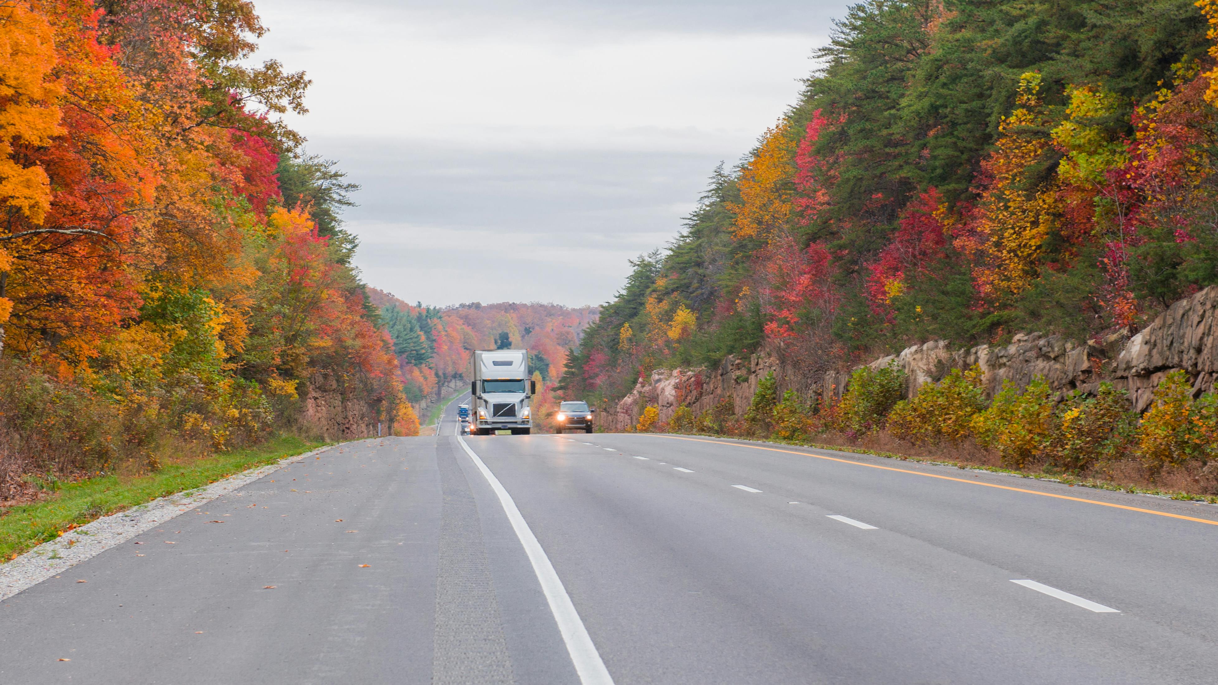 truck on autumn roads