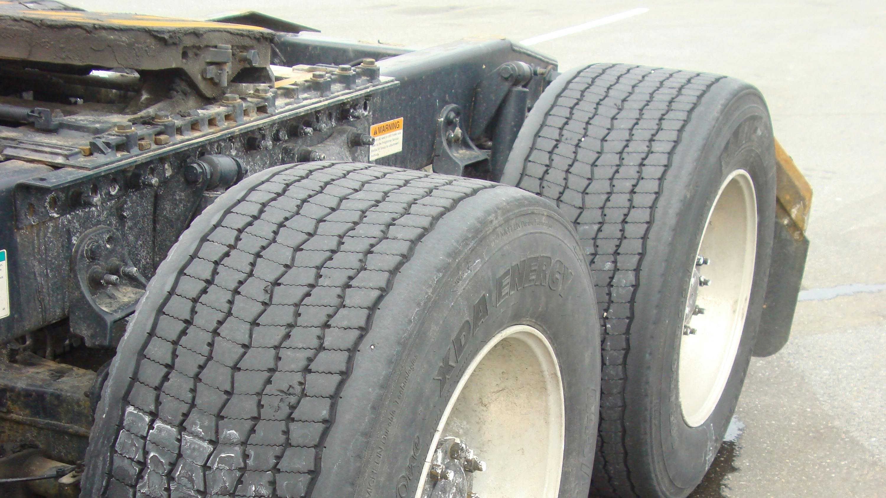 Evaluating EPA SmartWay: Fuel efficiency gains vs. emissions impact in trucking