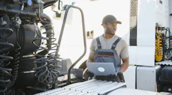 mechanic with computer mechanic with computer