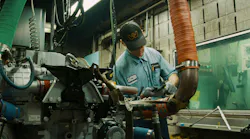 A technician conducts testing on a Detroit diesel engine at Daimler Trucks' Detroit Manufacturing Plant. A technician conducts testing on a Detroit diesel engine at Daimler Trucks' Detroit Manufacturing Plant.