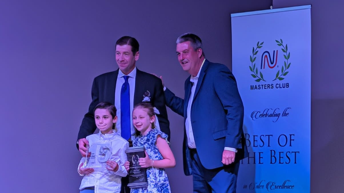 Lacy Teague honored as NationaLease Gene Scoggins Award winner at 25th NationaLease Masters Club Awards