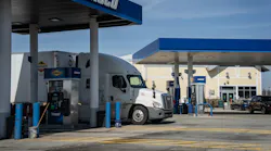 Semi-truck refueling at rest stop in Somerset Pennsylvania Semi-truck refueling at rest stop in Somerset Pennsylvania