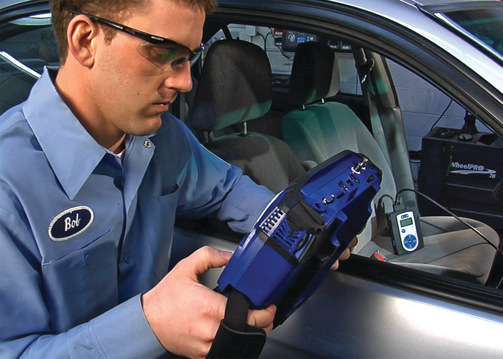 Uploading software from a scan tool through a wireless connection