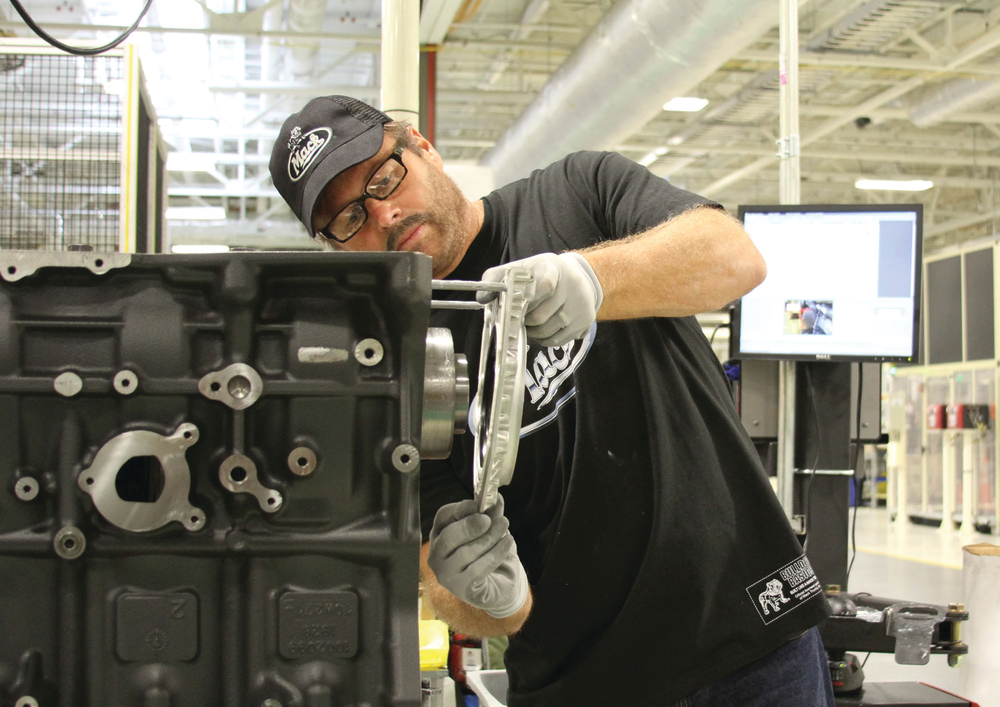 Denny Slagle, President and CEO of Mack Trucks, working incognito on his company's assembly lines in an episode of the television program Undercover Boss.