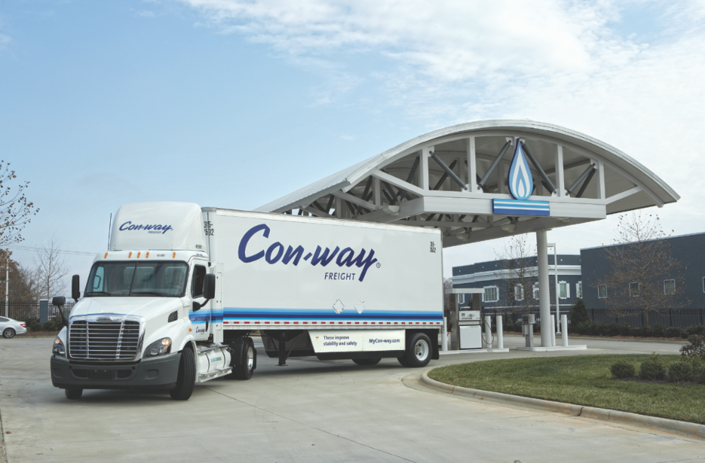 A new Freightliner Cascadia 113 day cab leaves a natural gas fueling station in Rock Hill, S.C. after taking on its first fill-up of compressed natural gas (CNG). Con-way Freight, one of the nation's leading commercial trucking firms, took delivery of the unit recently and is putting it into service in the Texas market. Featuring the Cummins Westport ISX 12 G natural gas-powered engine, it's Freightliner's first Cascadia 113 day cab with factory installed tanks to go into service.