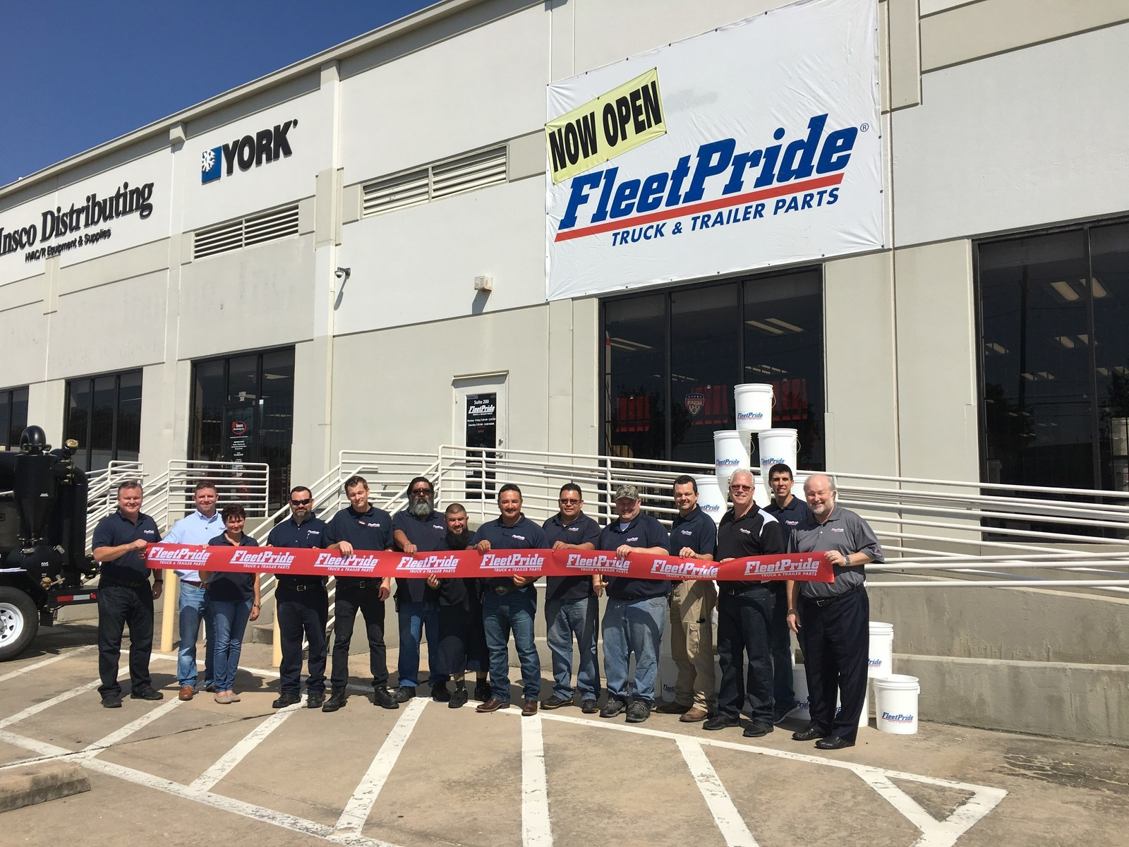FleetPride field management and branch staff officially open the new branch on October 12.