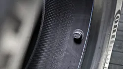 A tire-mounted sensor is adhered to the inner liner of a tire, and delivers tire pressure and temperature data wirelessly to the vehicle or fleet terminal. A tire-mounted sensor is adhered to the inner liner of a tire, and delivers tire pressure and temperature data wirelessly to the vehicle or fleet terminal.