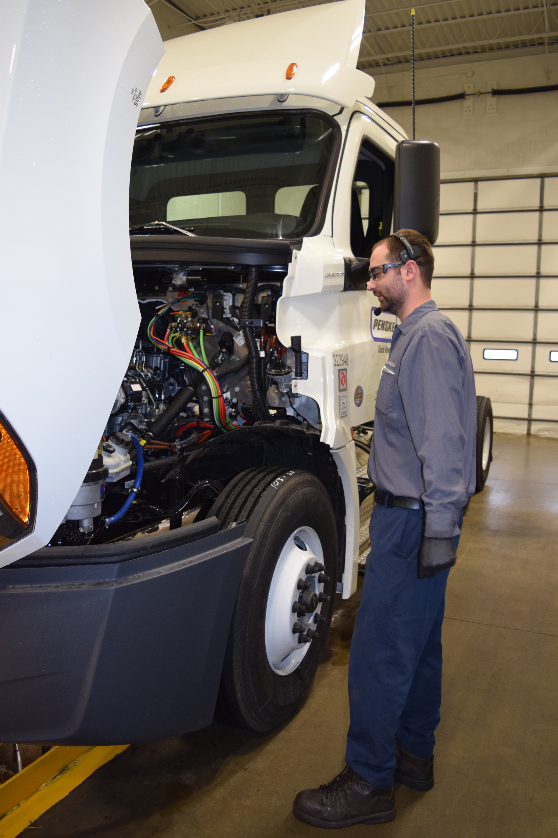 Penske technicians receive training to conduct PMs using voice-recognition software, recording responses verbally instead of by paper.