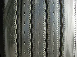 (SECTION 3: Irregular steer tire conditions) 3. Erosion/River Wear Appearance: Circumferential worn area situated on the sides of the tread ribs. Probable Cause: Condition most commonly occurs on slow wearing radial tires in steer or trailer position (free rolling). Corrective Action: None. Tire Disposition: Continue to run. (SECTION 3: Irregular steer tire conditions) 3. Erosion/River Wear Appearance: Circumferential worn area situated on the sides of the tread ribs. Probable Cause: Condition most commonly occurs on slow wearing radial tires in steer or trailer position (free rolling). Corrective Action: None. Tire Disposition: Continue to run.