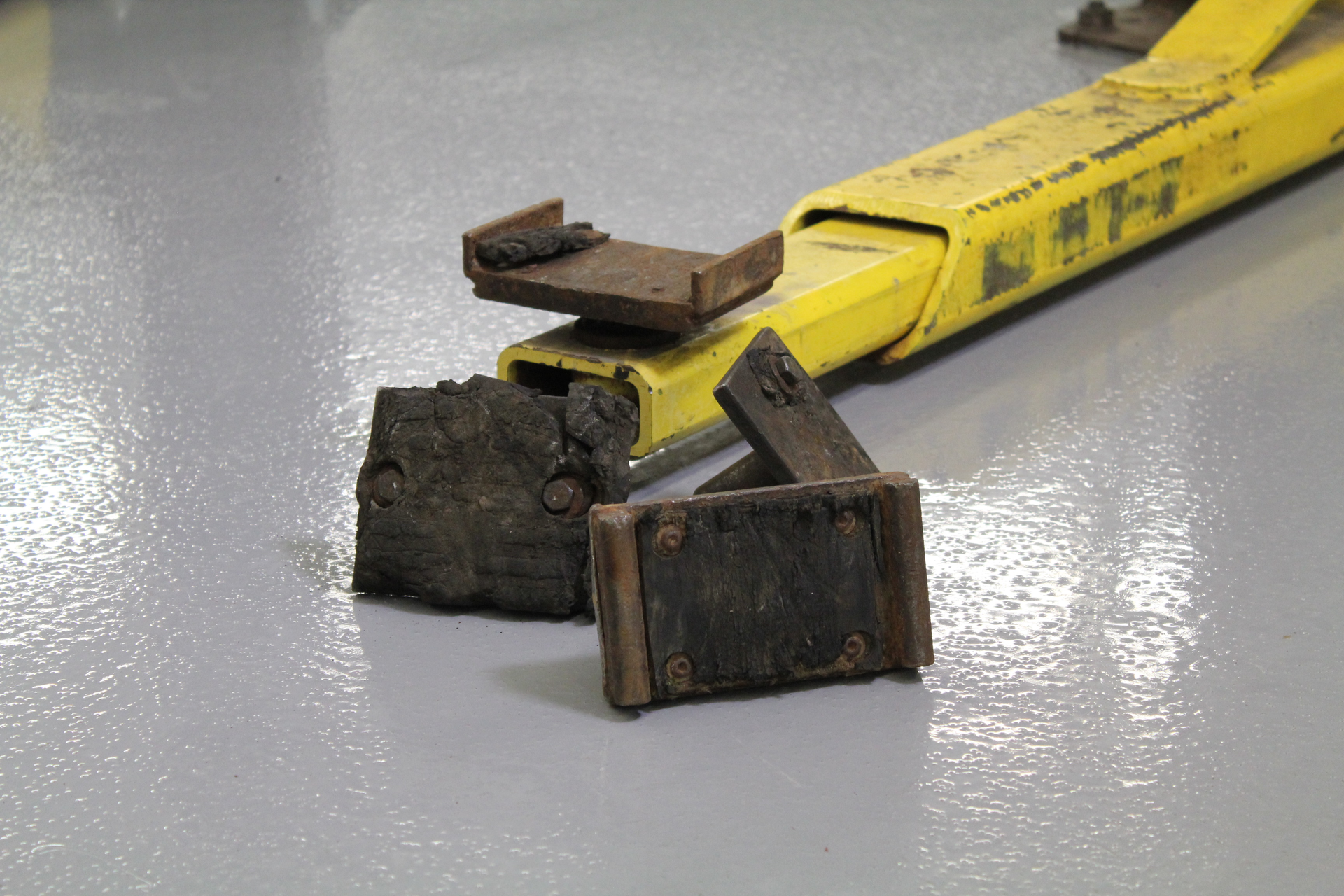 To improve bay safety, technicians should get to know their lifts by truly paying attention to potential safety hazards or damage to the lift and its accessories. For example, it is important to check lift contact points such as lifting pads to make sure they are free of debris, grease, oil, and anything else that may prevent solid contact. Adapters in the condition shown here should not be used.