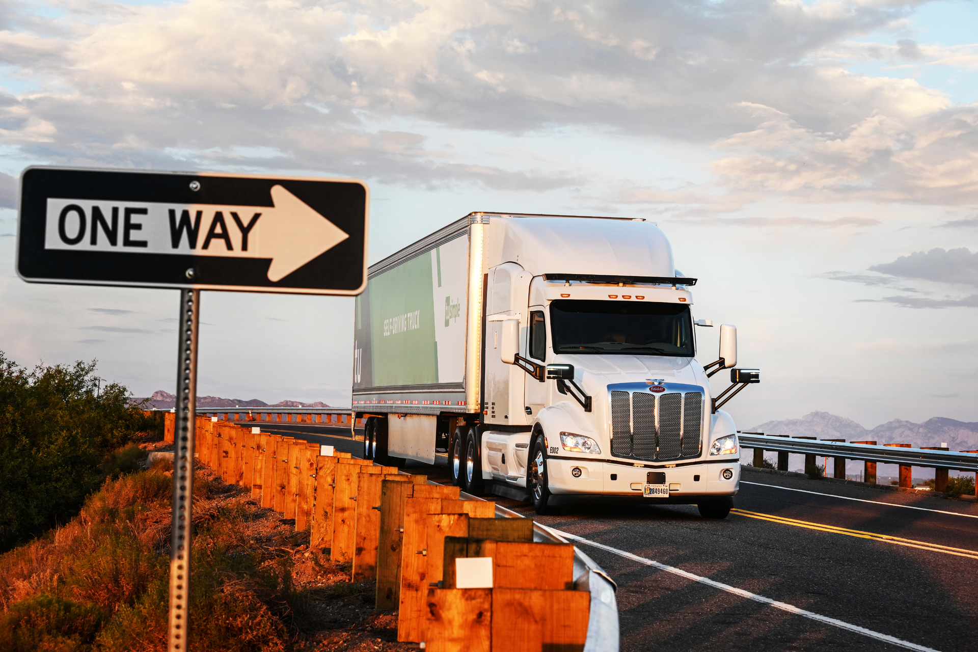 Technology companies like TuSimple are working together with truck manufacturers to develop and deliver autonomous commercial vehicles.