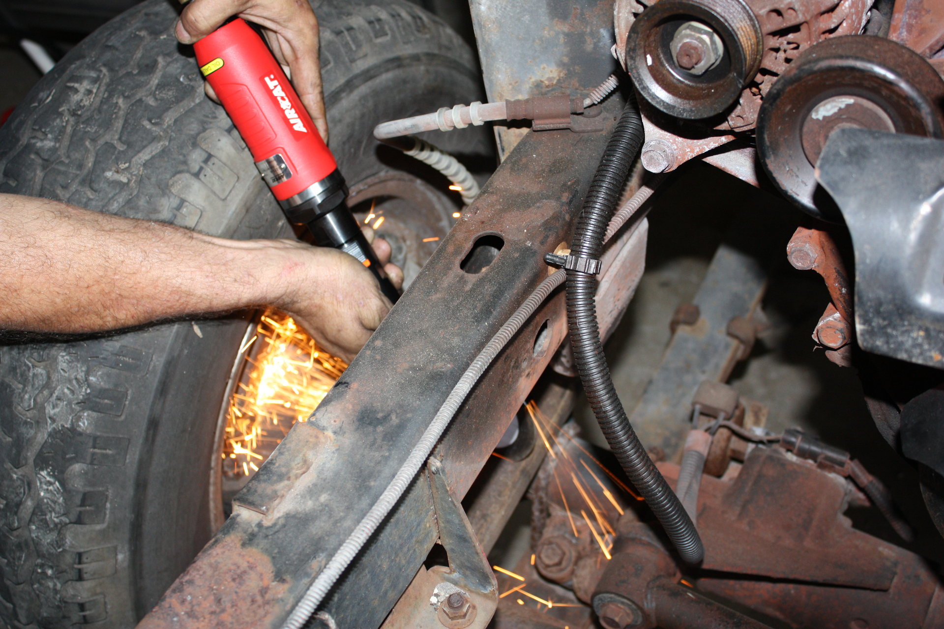 An extended reach cut-off tool, such as AIRCAT's 6275-A, is ideal for cutting material, axles, and anything bent with a better reach.