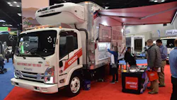 An Isuzu N-Series doubles a craft beer tap during Work Truck Week 2022 at the Indianapolis Convention Center. An Isuzu N-Series doubles a craft beer tap during Work Truck Week 2022 at the Indianapolis Convention Center.
