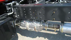 Full exhaust aftertreatment system mounted to the bottom of the chassis rail on an Isuzu 7500. Full exhaust aftertreatment system mounted to the bottom of the chassis rail on an Isuzu 7500.
