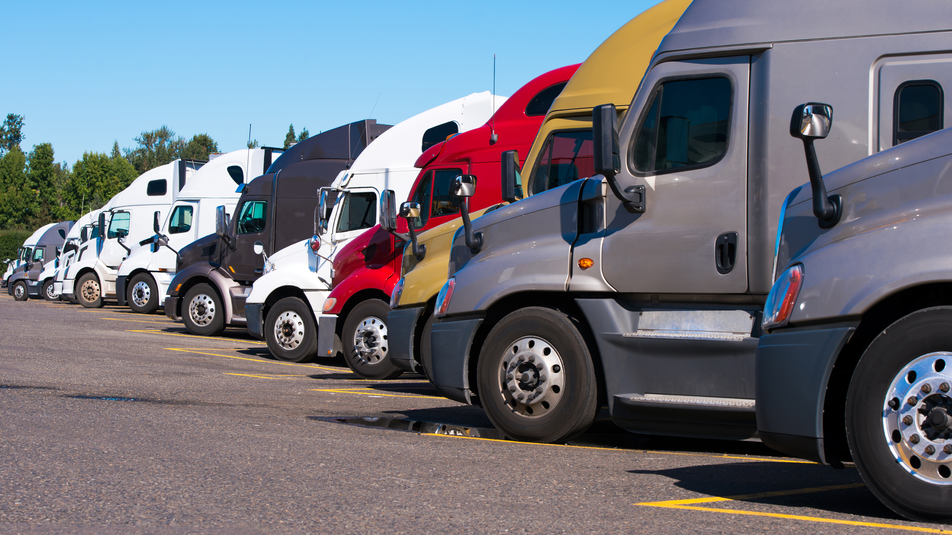Dreamstime Xxl 104037044 Vitpho Trucks Lined Up 6430195472ec0 64348a8f9b48a