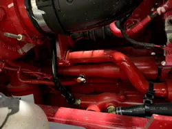 A Checkfluid KP Pushbutton Pressurized Oil Sampling Valve installed on a Cummins X15 engine. To draw a sample, remove the cap on the spout; no oil will come out until the valve is activated. Rotate the spout downward or sideways to the desired fill angle into the bottle. Then push to open, and release to close. The valve shuts off instantly and automatically with no drips or mess, the company says. A Checkfluid KP Pushbutton Pressurized Oil Sampling Valve installed on a Cummins X15 engine. To draw a sample, remove the cap on the spout; no oil will come out until the valve is activated. Rotate the spout downward or sideways to the desired fill angle into the bottle. Then push to open, and release to close. The valve shuts off instantly and automatically with no drips or mess, the company says.